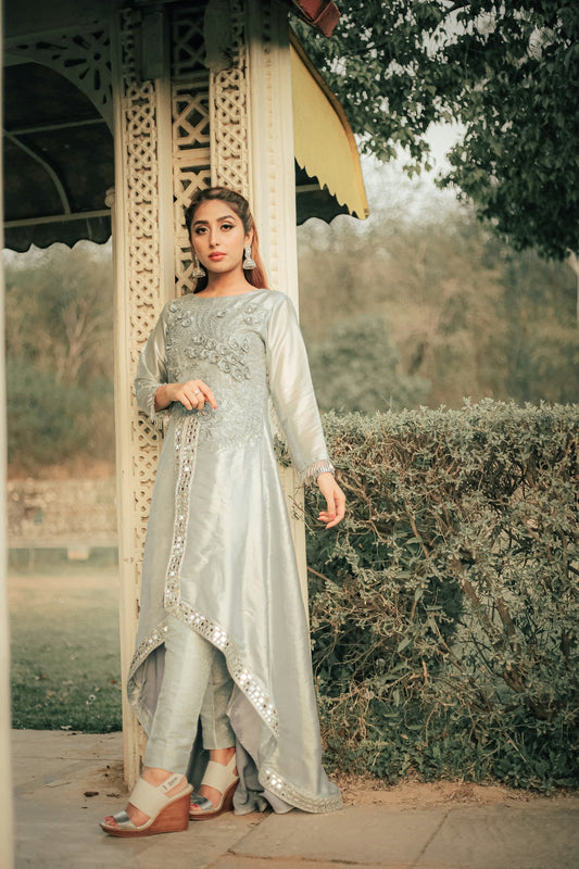 woman in white long sleeve dress holding yellow umbrella