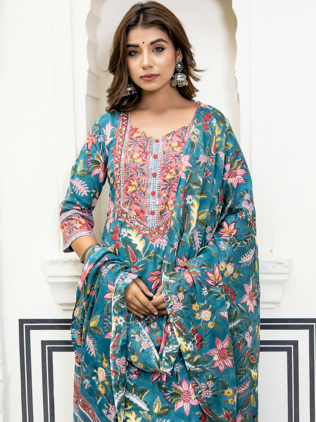 a person in a floral dress