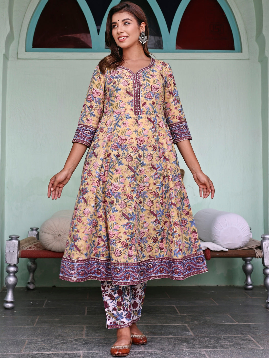 a woman wearing a colorful dress