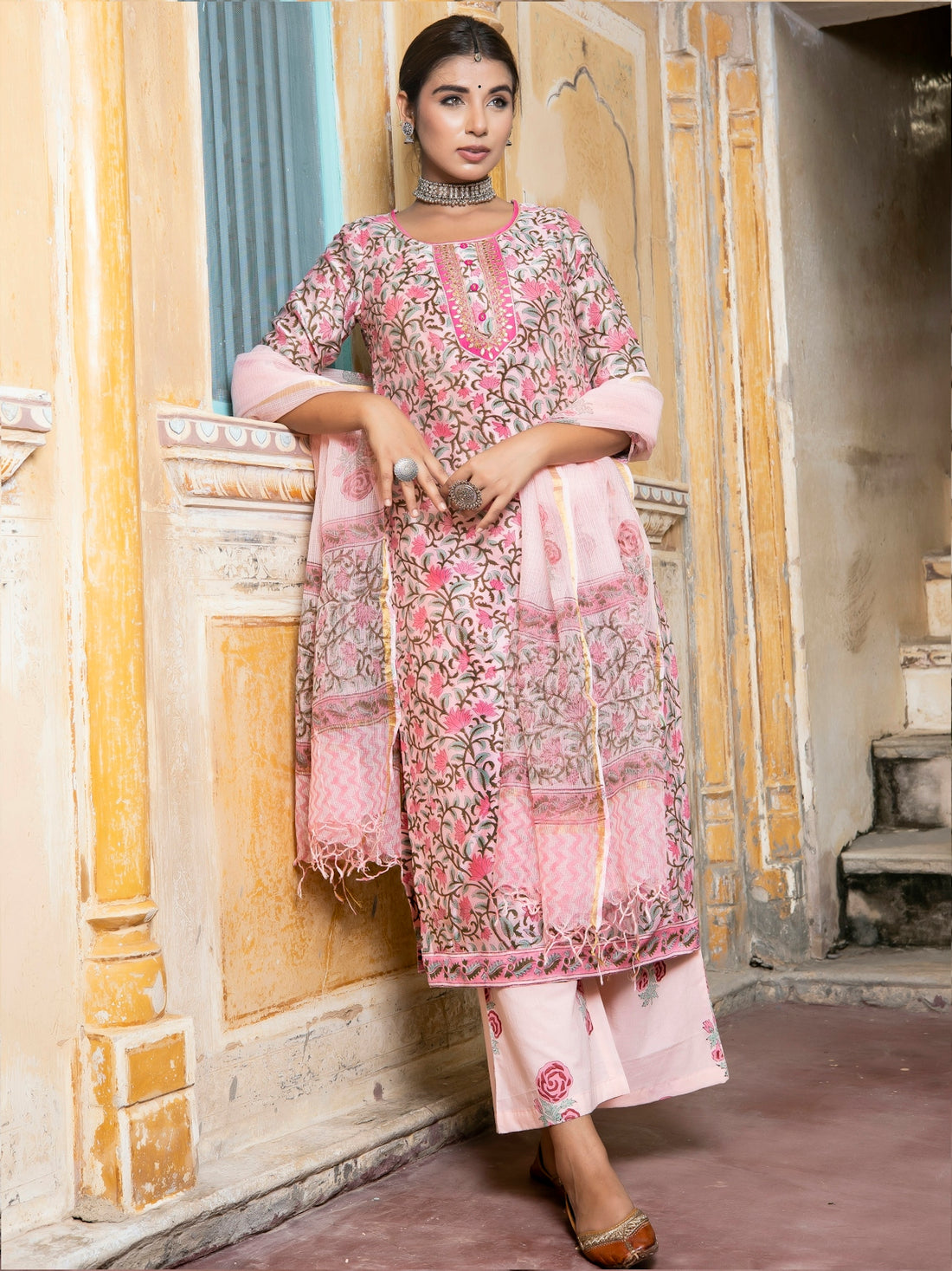 a woman in a pink dress
