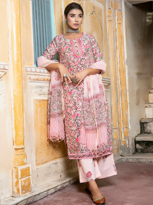 a woman in a pink dress