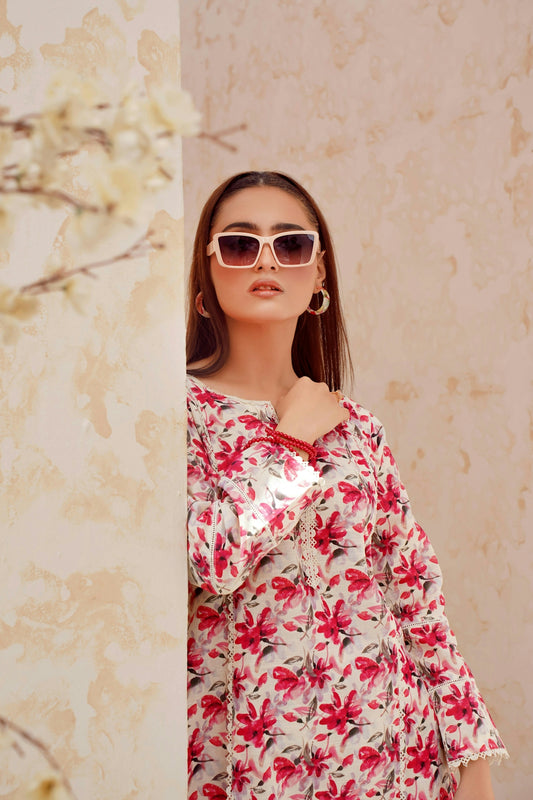 Young woman with sunglasses and floral print dress